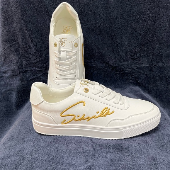 Siksilk Shoes - Siksilk NWOT White Leather Sneakers  W/ Gold Accents Women’s Size 9